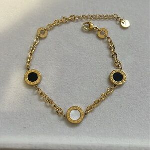 Gold plated stainless steel Roman numeral round link bracelet